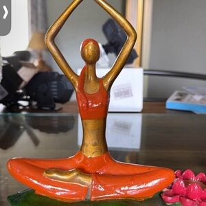 Elegant Gold and Orange Yoga Figurine